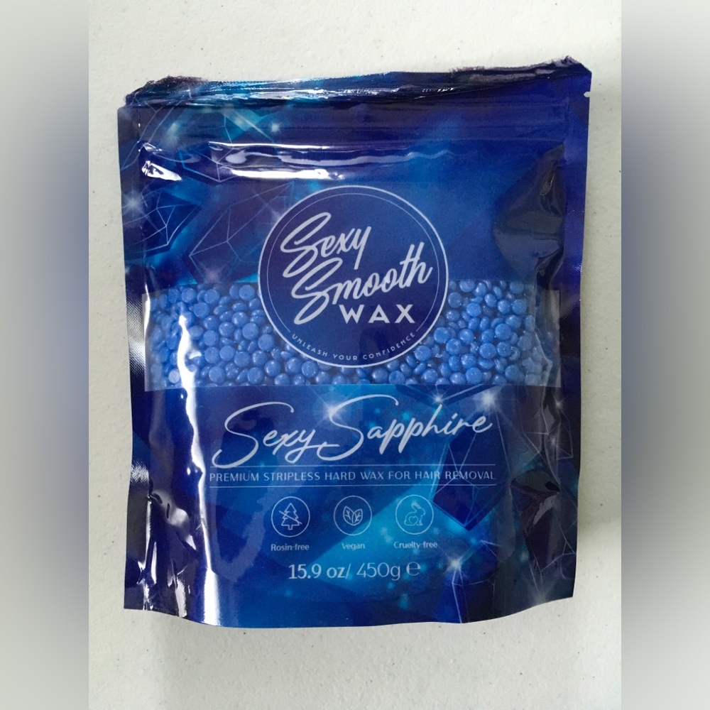UNOPENED Sexy Smooth Wax
Sexy Sapphire Synthetic Hard Wax Non-Scented 15.9oz Bag